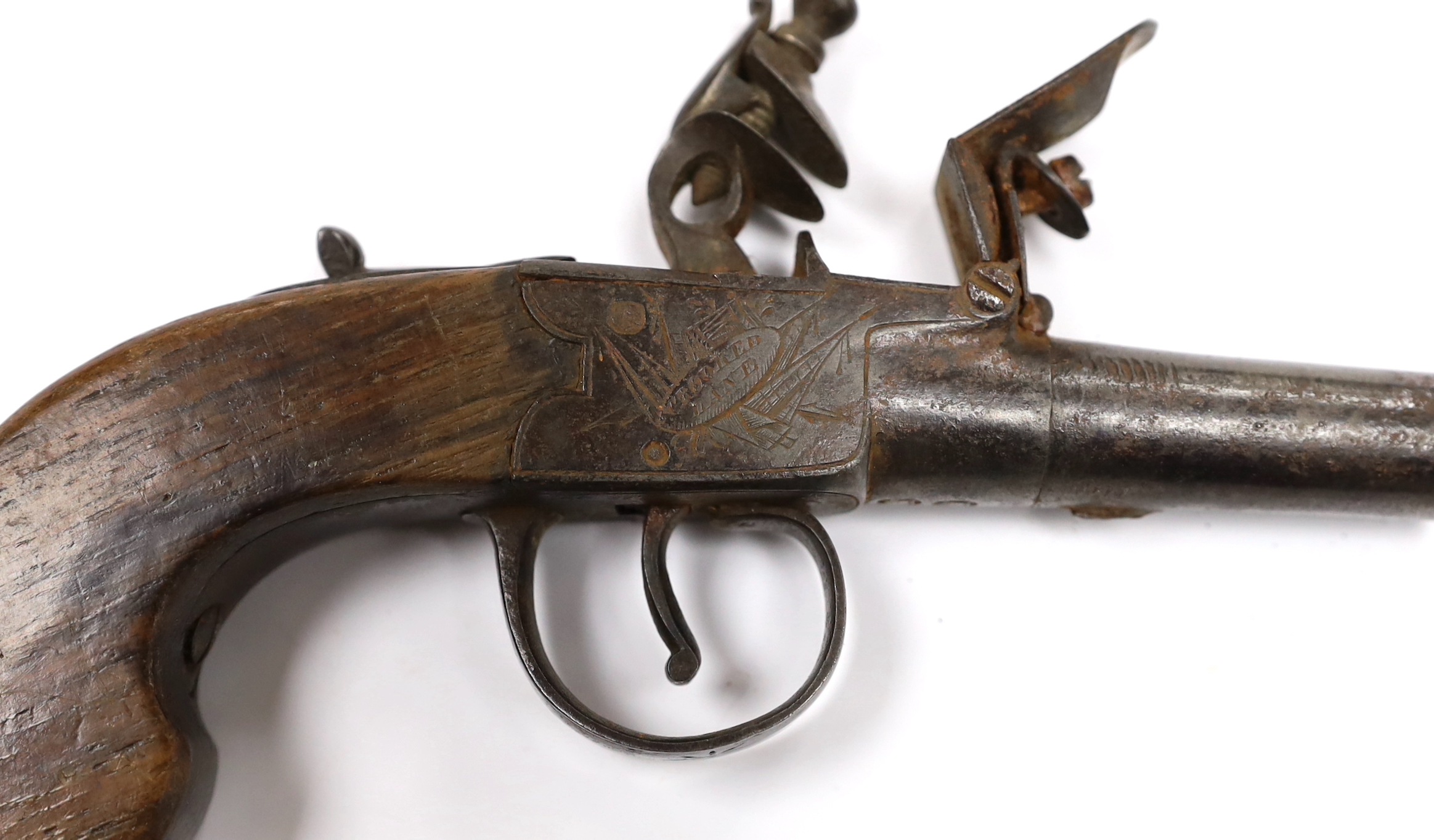 A flintlock pocket pistol, c.1830, frame engraved with trophies of flags, maker Stevens, Crooked Lane